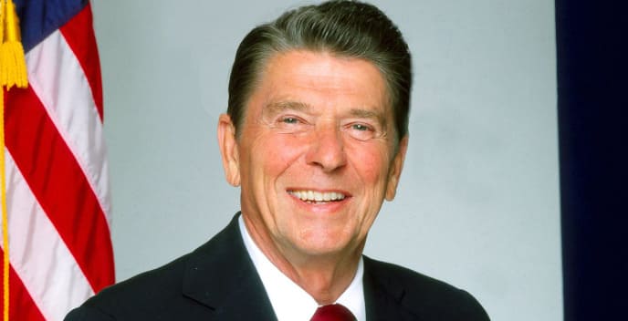 Which former Hollywood actor and "Great Communicator" has a major economic theory named after him?